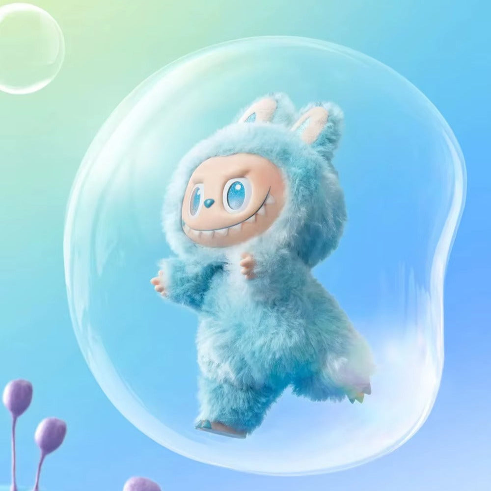 Muñeco sorpresa labubu en caja misteriosa.