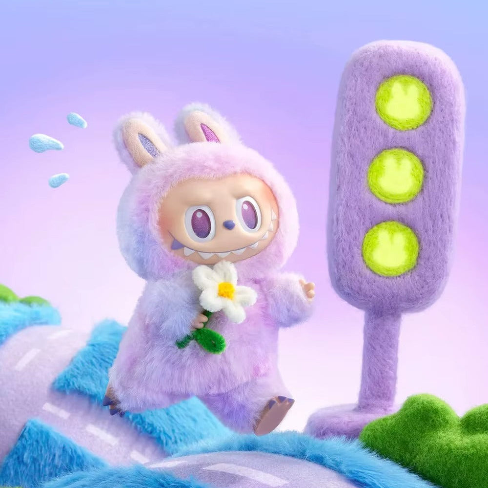 Muñeco sorpresa labubu en caja misteriosa.