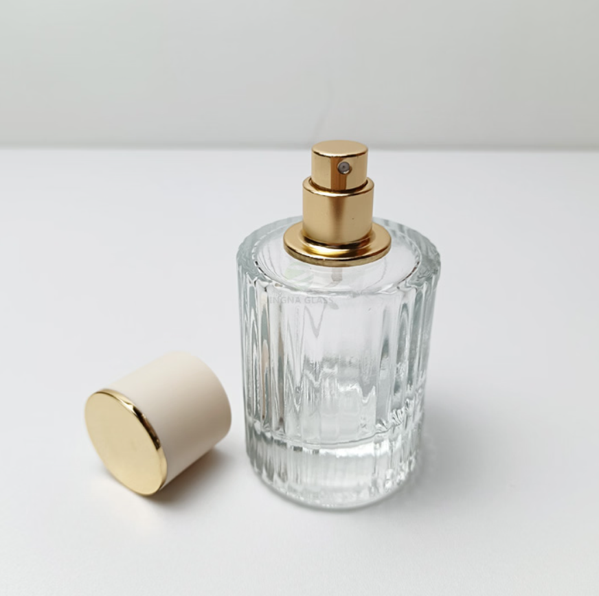 Botella de perfume vacía de 30 ml hecha de vidrio transparente.